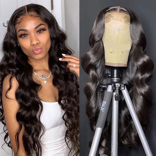Loose deep wave 13x4 lace front wig in Remy human hair, natural color, long body wave style on a woman