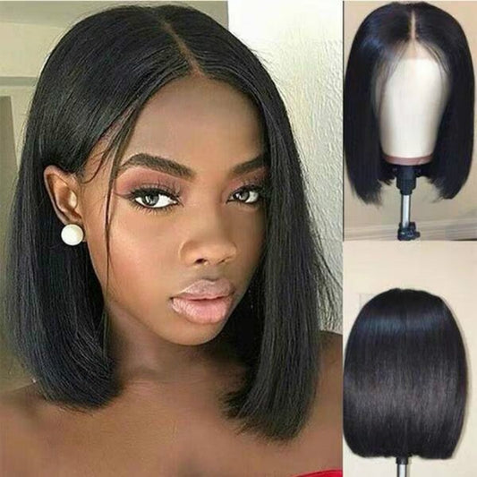 Short bob wig in heat resistant synthetic fibre, natural black colour, chin-length silhouette shown on a model